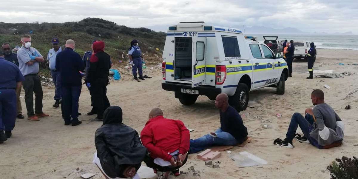 Law Enforcement Marine Unit officers arrest four men dumping three bodies at Cape Town beach